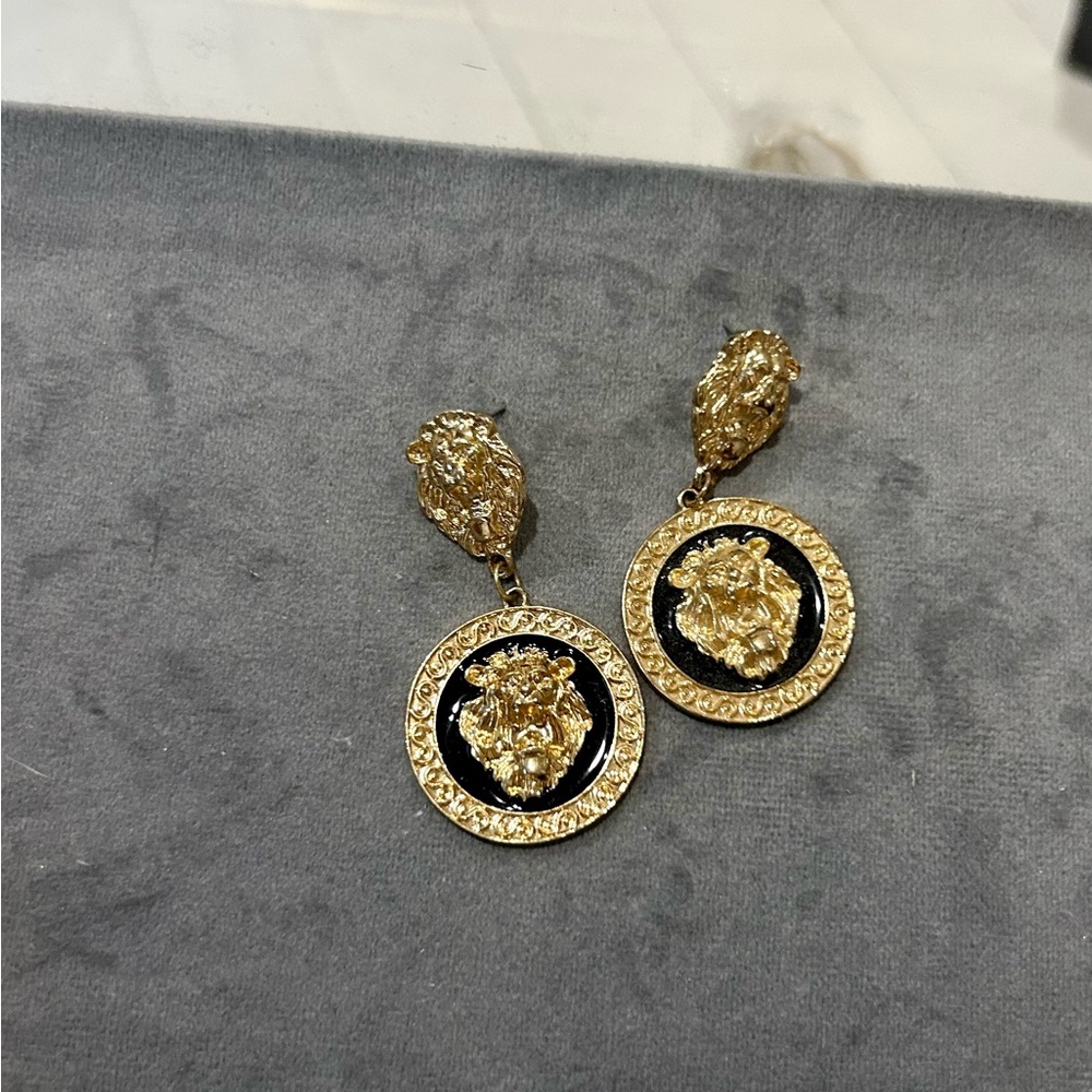 Gold and black earrings
